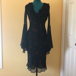 Faux wrap dress with exaggerated bell sleeves